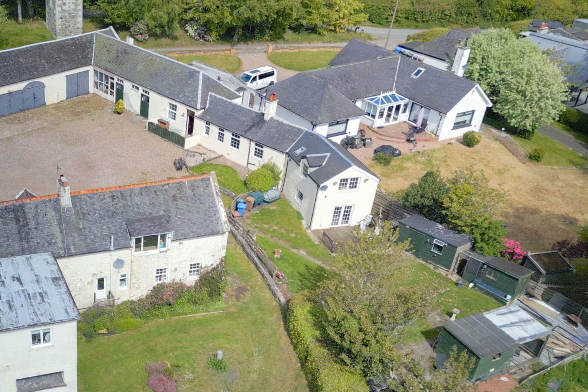 The whole Corraith estate from above: Corraith House, the cottages, the courtyard and the folly
